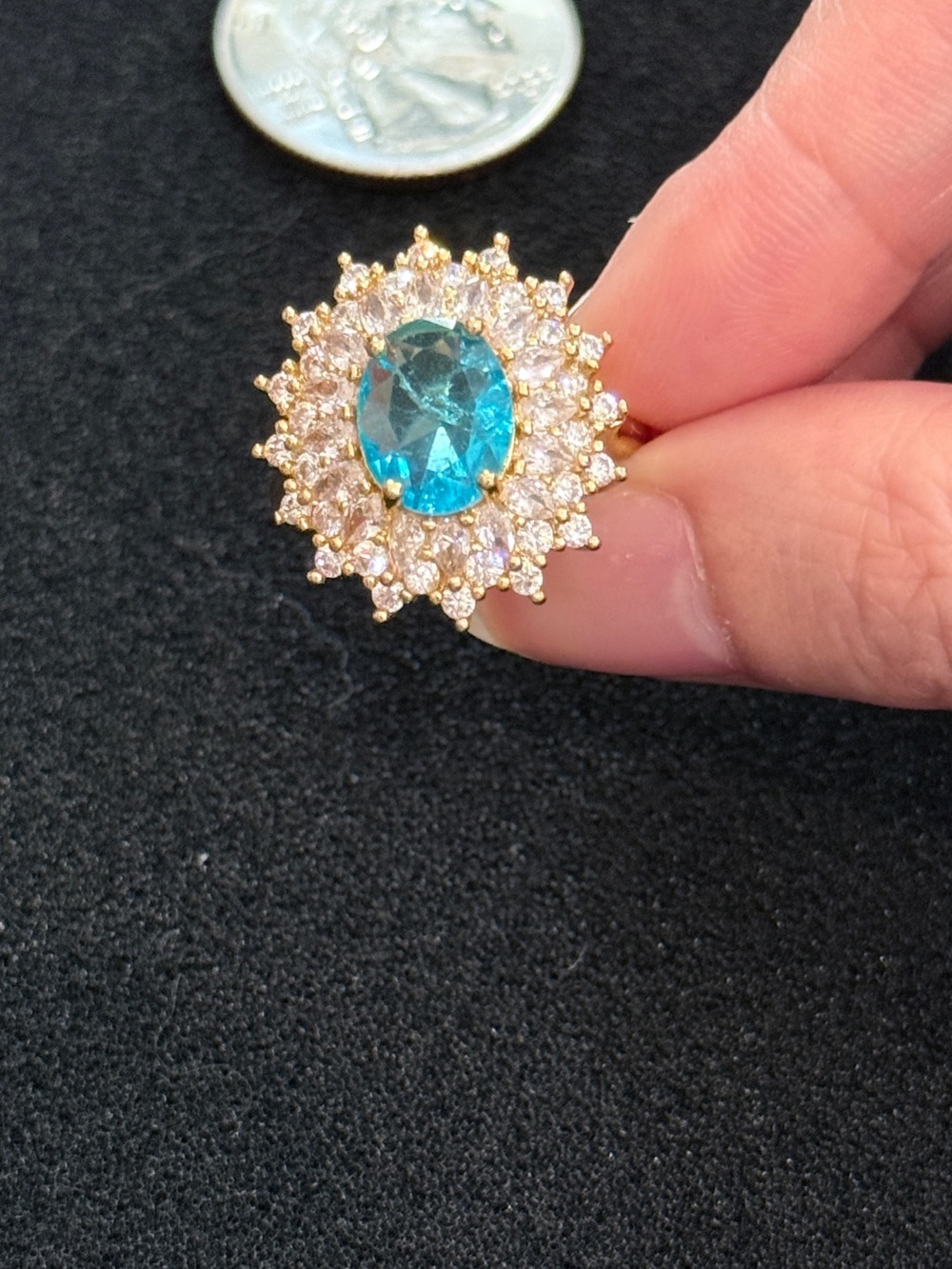 Gold-Tone Halo Ring with Blue Oval Center Stone adjustable size